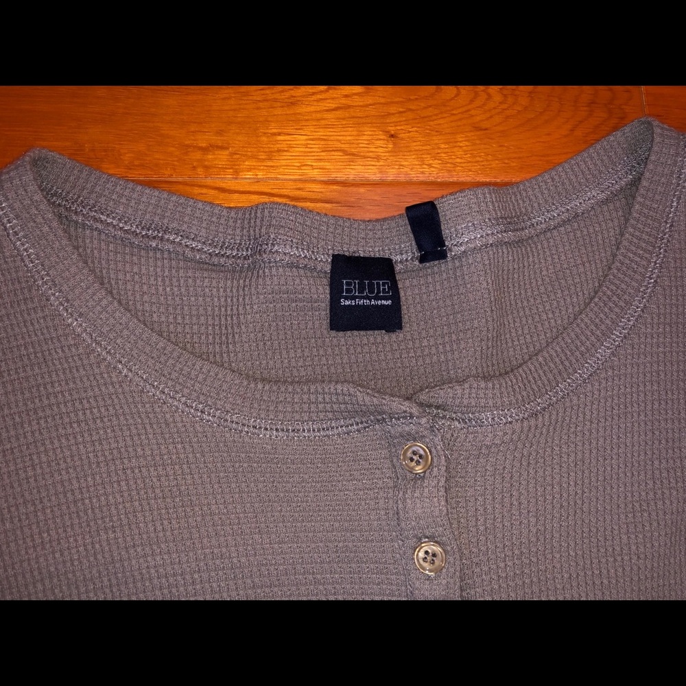 A grey long sleeve shirt